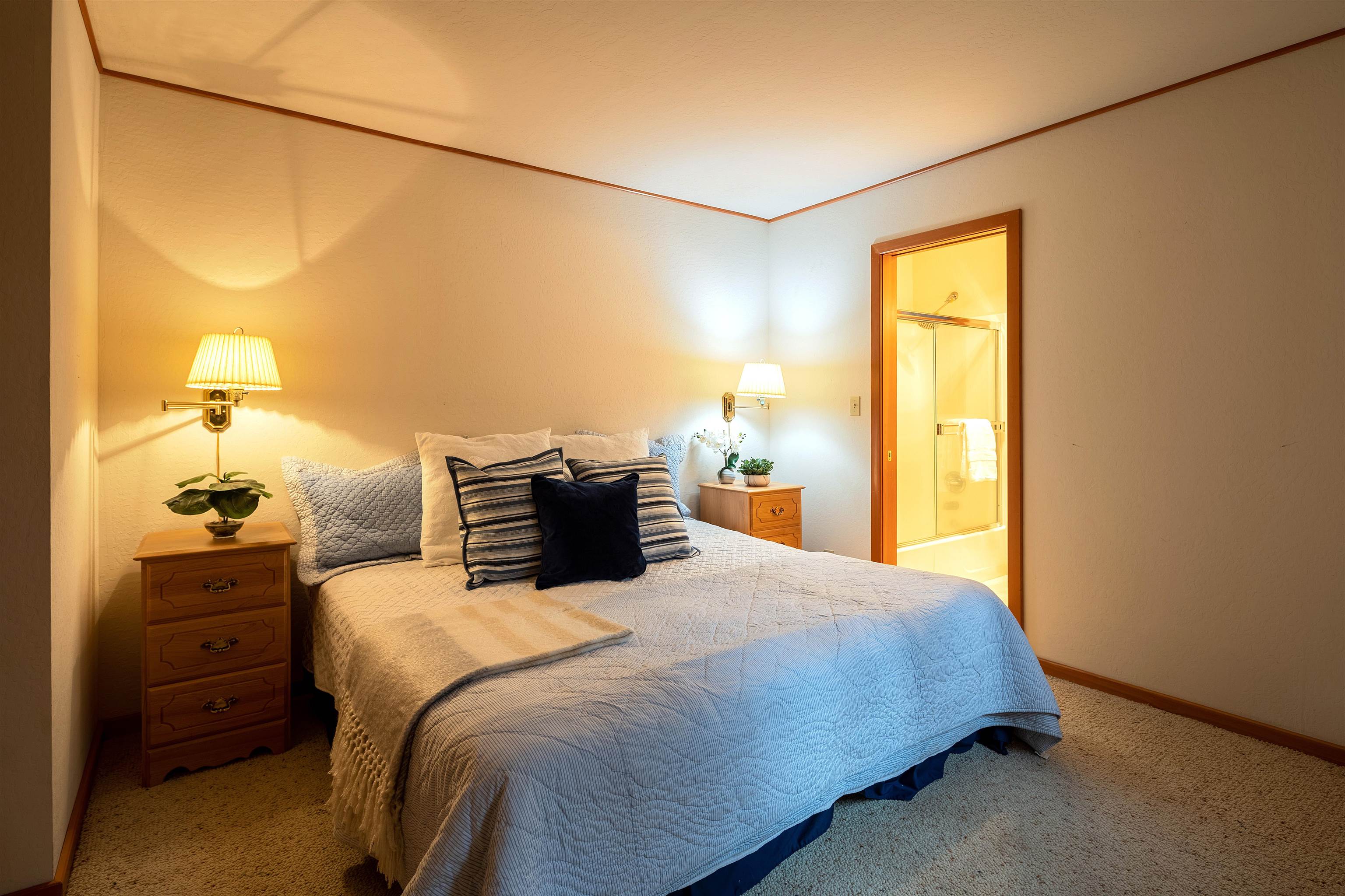 11406 Chalet Road Truckee, CA 96161 - Photo 14 of 21 a bedroom with a bed and cabinets