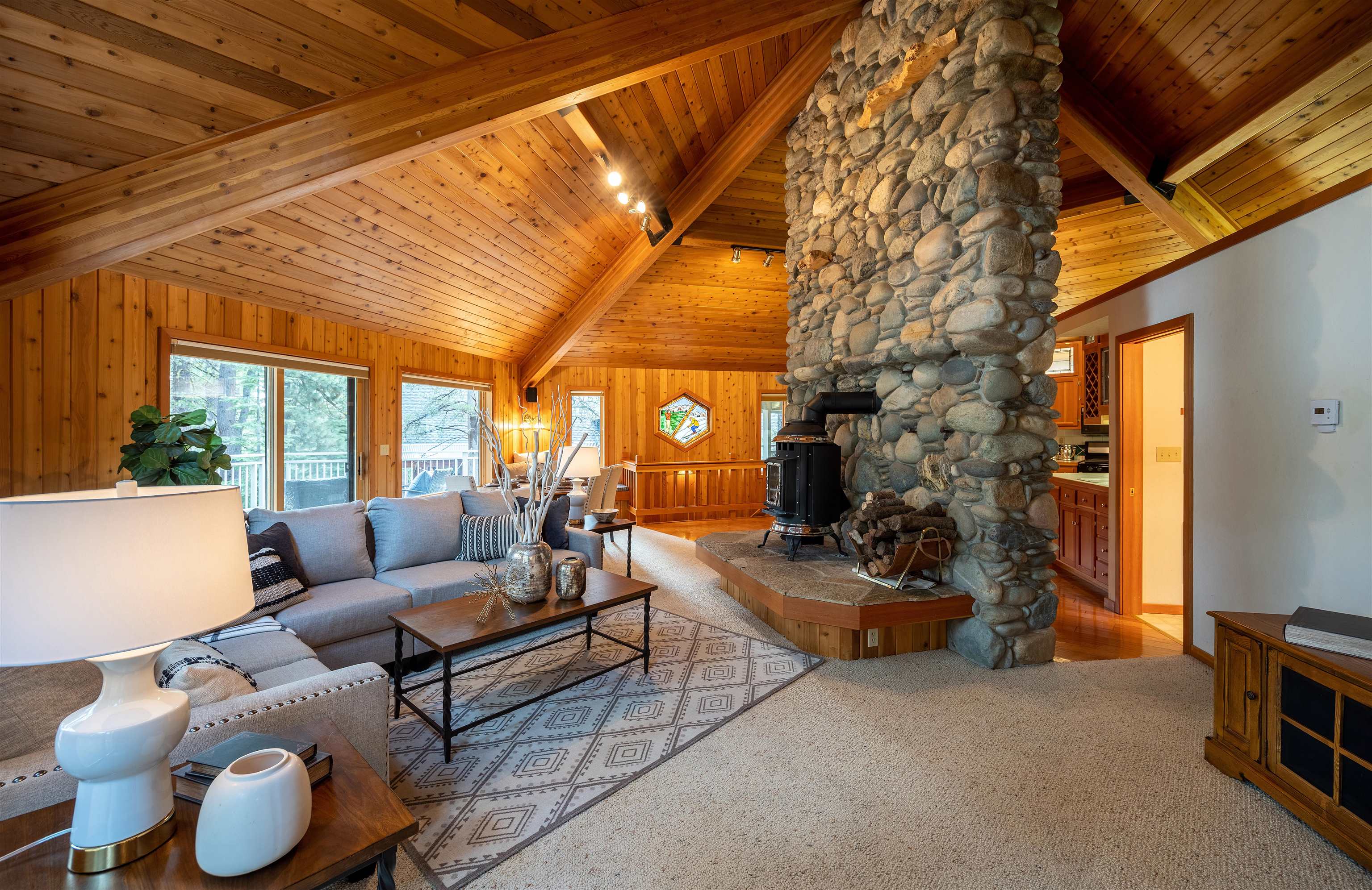 11406 Chalet Road Truckee, CA 96161 - Photo 4 of 21 a living room with furniture and a fireplace