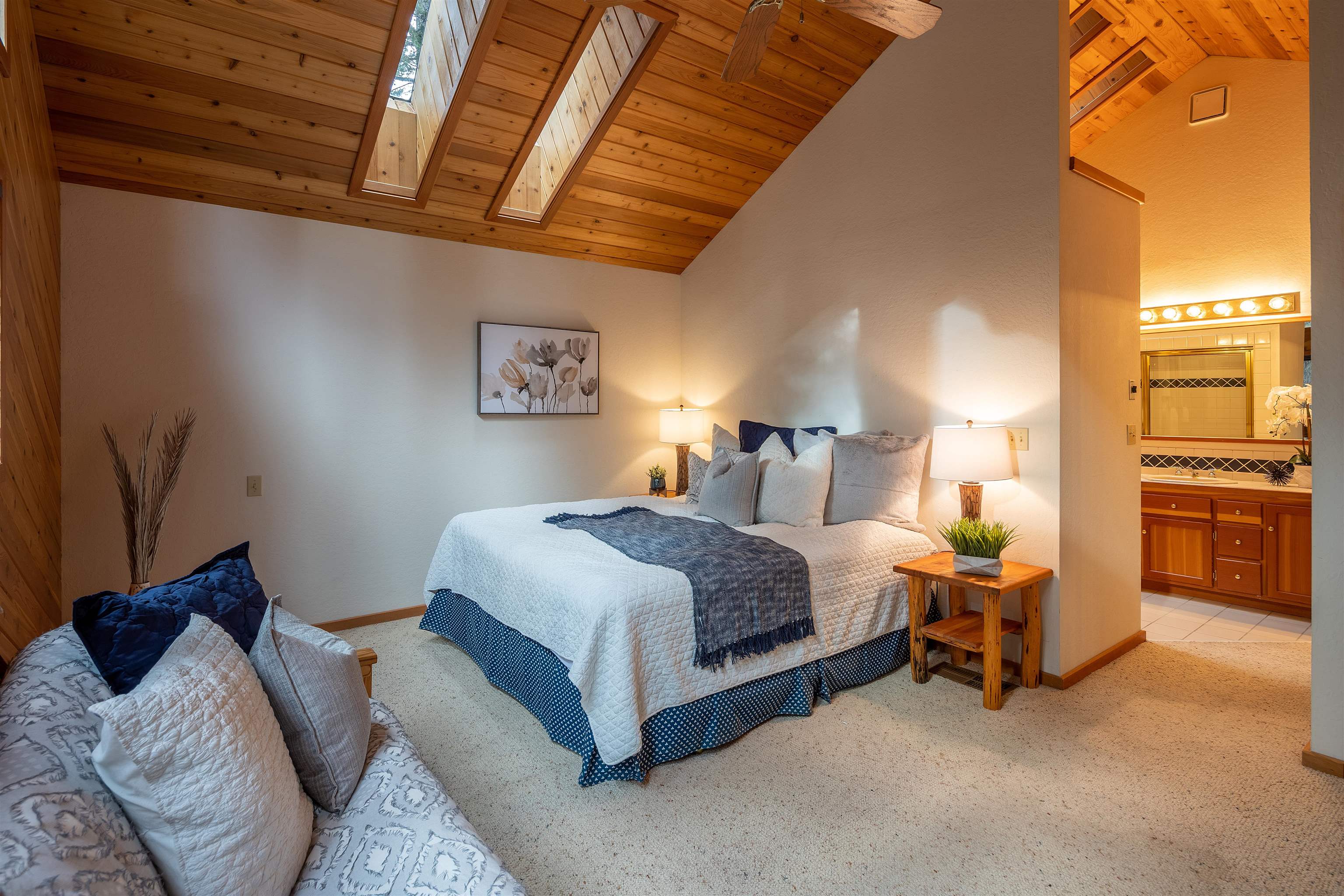 11406 Chalet Road Truckee, CA 96161 - Photo 8 of 21 a spacious bedroom with a bed and a view of bedroom