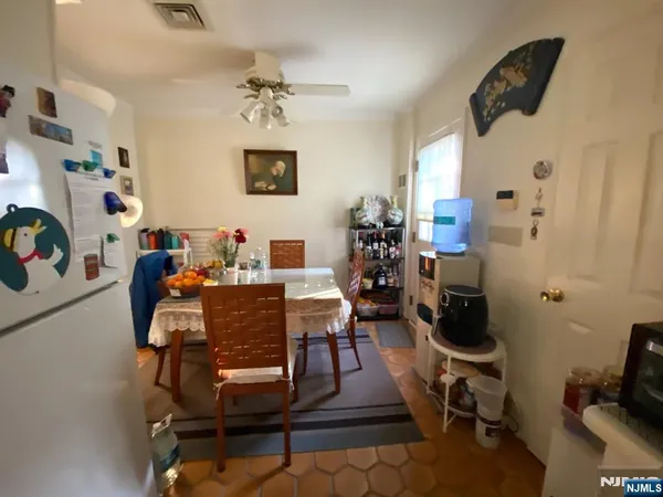 a view of a workspace with furniture and toys