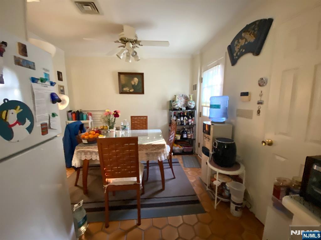 81 5th Street Cresskill, NJ 07626 - Photo 4 of 13 a view of a workspace with furniture and toys