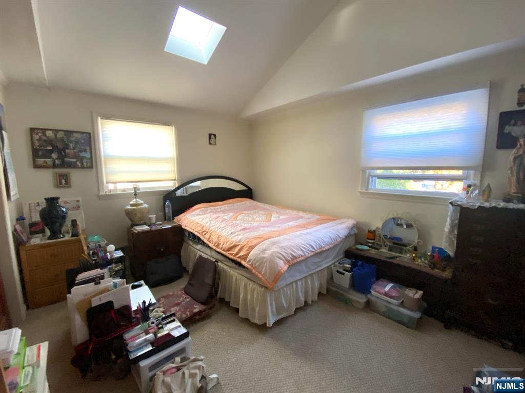 81 5th Street Cresskill, NJ 07626 - Photo 10 of 13 a bedroom with a bed and a window