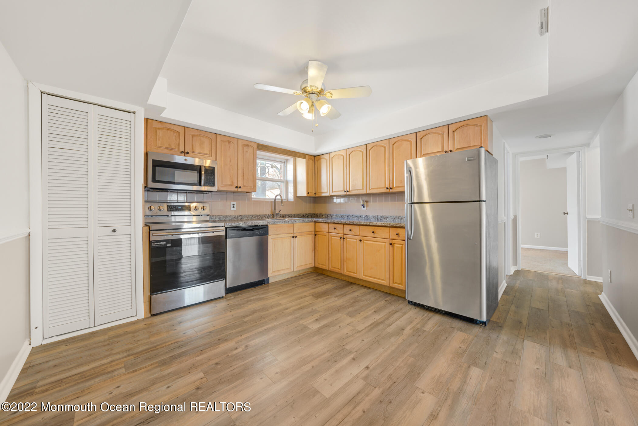 1008 Unicorn Way, Unit R002 Clifton, NJ 07011 - Photo 13 of 30 a kitchen with a refrigerator a sink and dishwasher