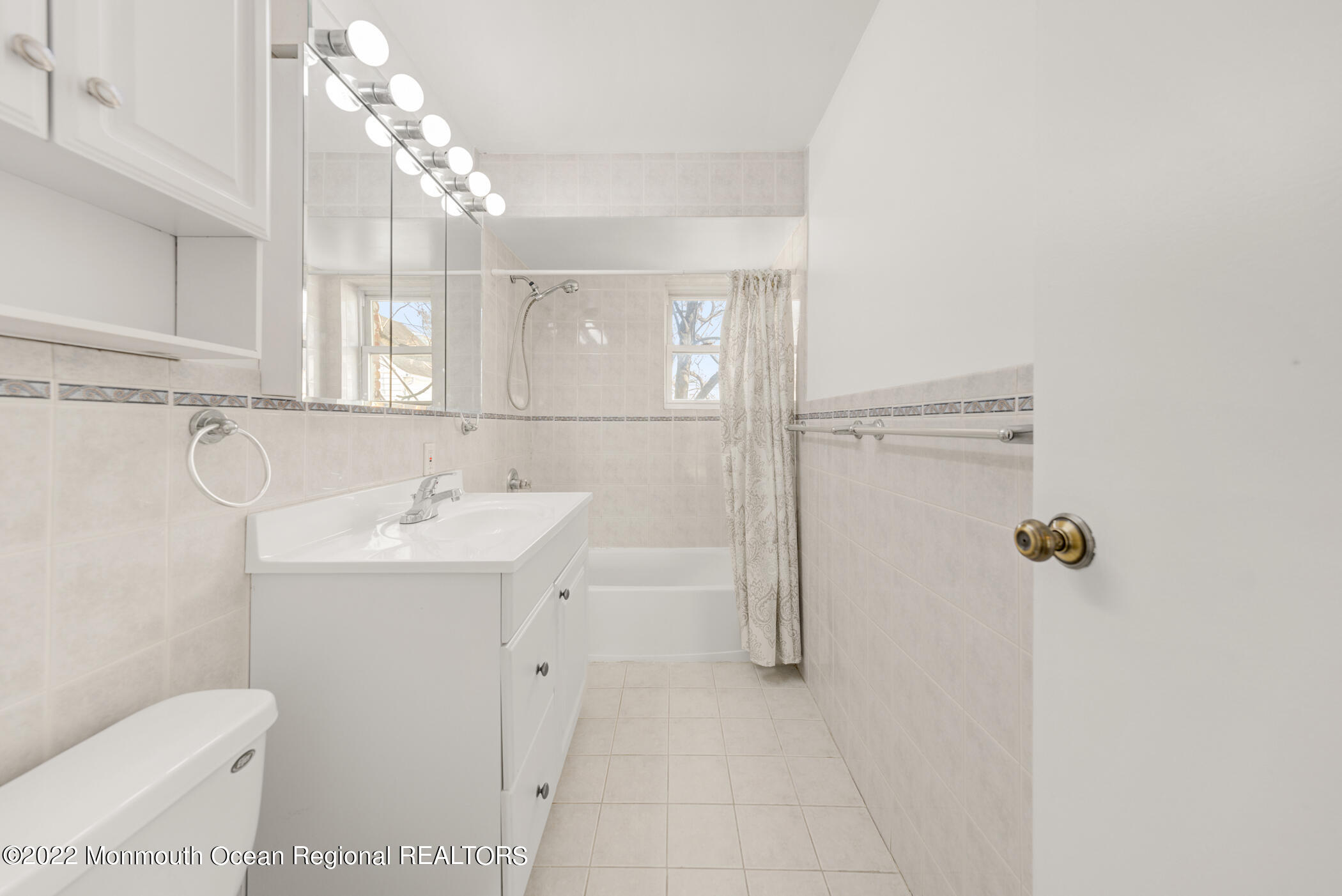 1008 Unicorn Way, Unit R002 Clifton, NJ 07011 - Photo 19 of 30 a bathroom with a sink toilet and shower