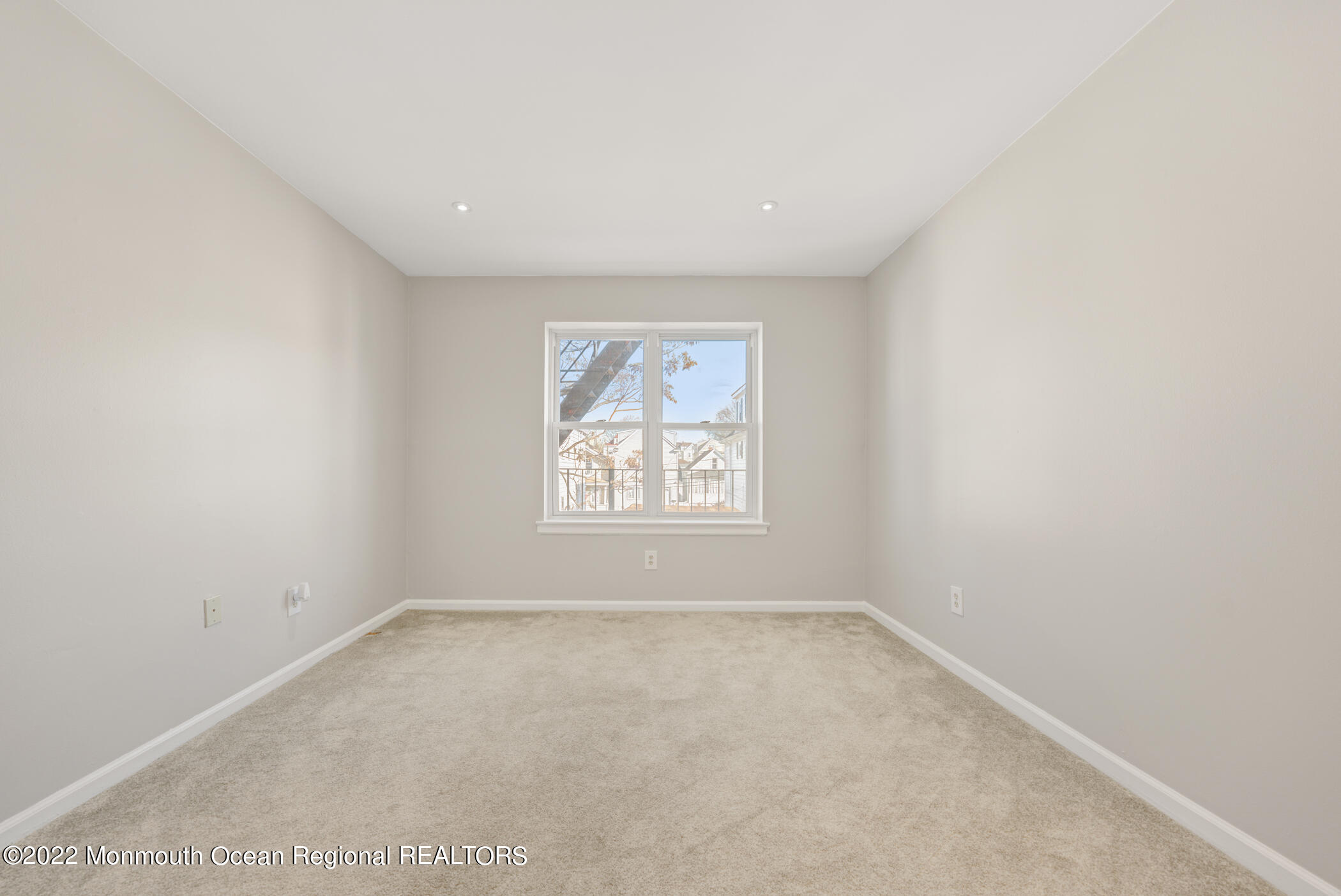 1008 Unicorn Way, Unit R002 Clifton, NJ 07011 - Photo 24 of 30 an empty room with a window