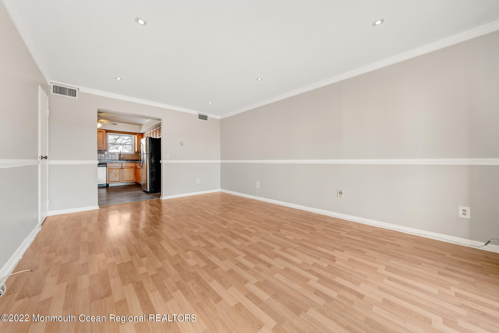 1008 Unicorn Way, Unit R002 Clifton, NJ 07011 - Photo 9 of 30 a view of empty room with wooden floor