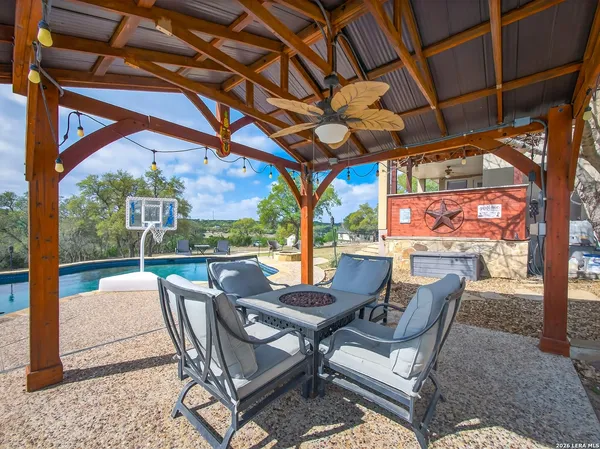 a view of a backyard of the house