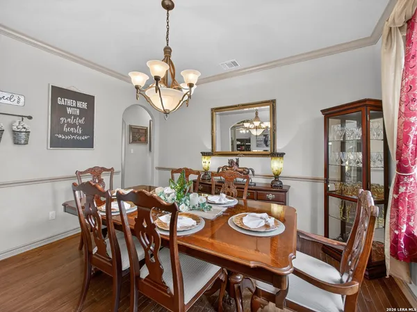 a living room with furniture fireplace and flat screen tv