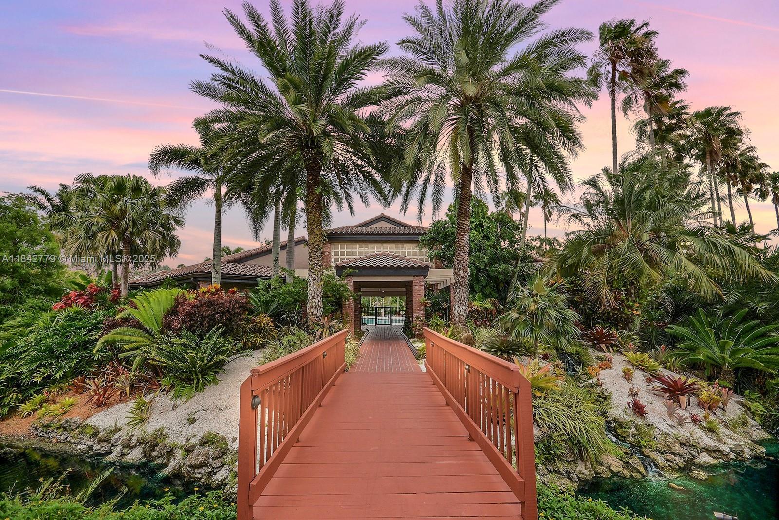 10621 Paris Street Cooper City, FL 33026 - Photo 49 of 58 a view of a house with a patio