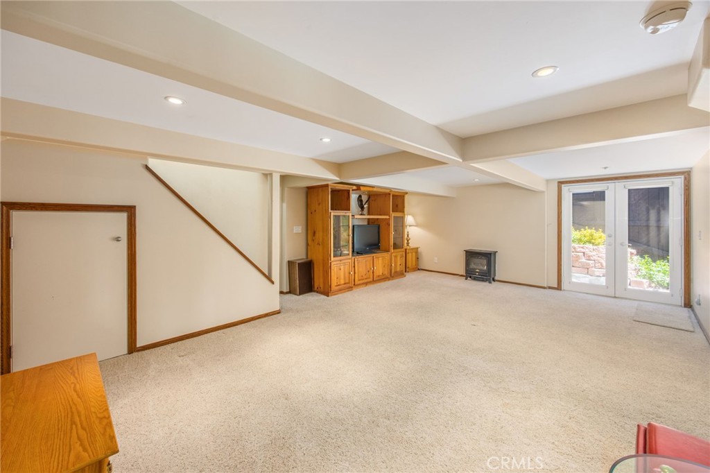 1134 Scenic Way Rimforest, CA 92378 - Photo 16 of 37 Large Family Room space with French Door access to the outside
