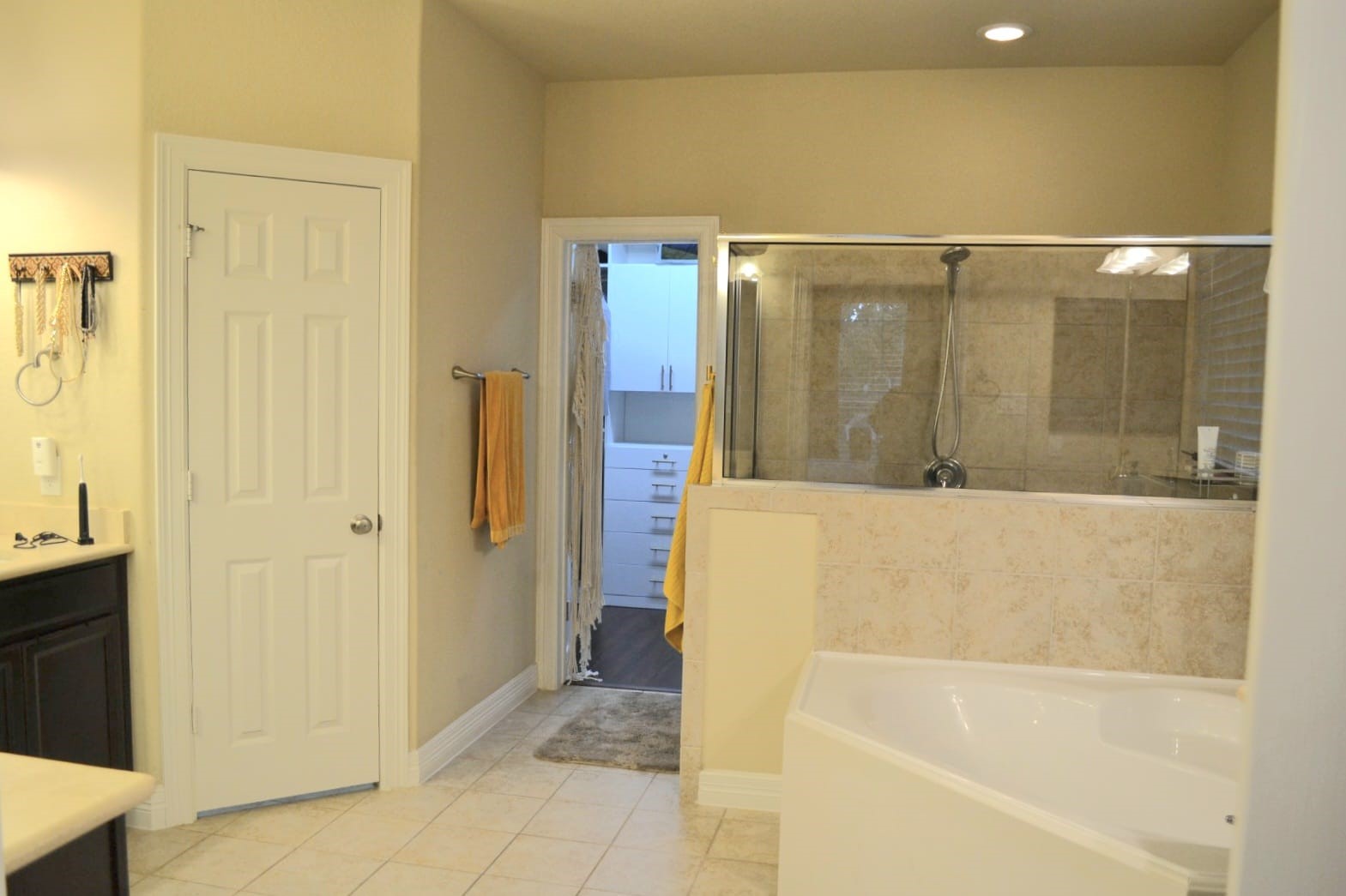5206 Jacob Ridge Court Sugar Land, TX 77479 - Photo 12 of 42 a bathroom with a bathtub and shower