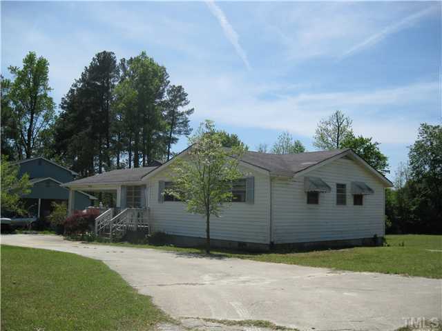 2620 Old Williams Road Raleigh, NC 27610 - Photo 3 of 17 a view of a house with a garden