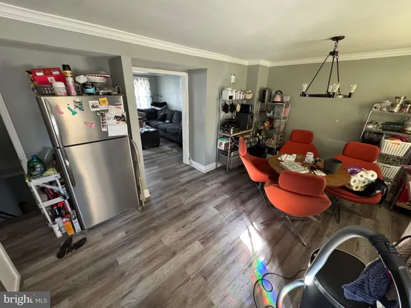 a room with lots of stuff and wooden floor