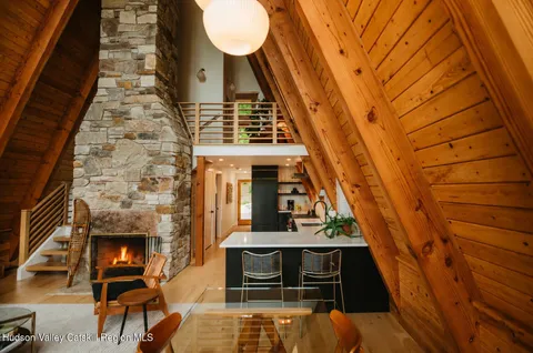 a kitchen with stainless steel appliances granite countertop a refrigerator and a stove