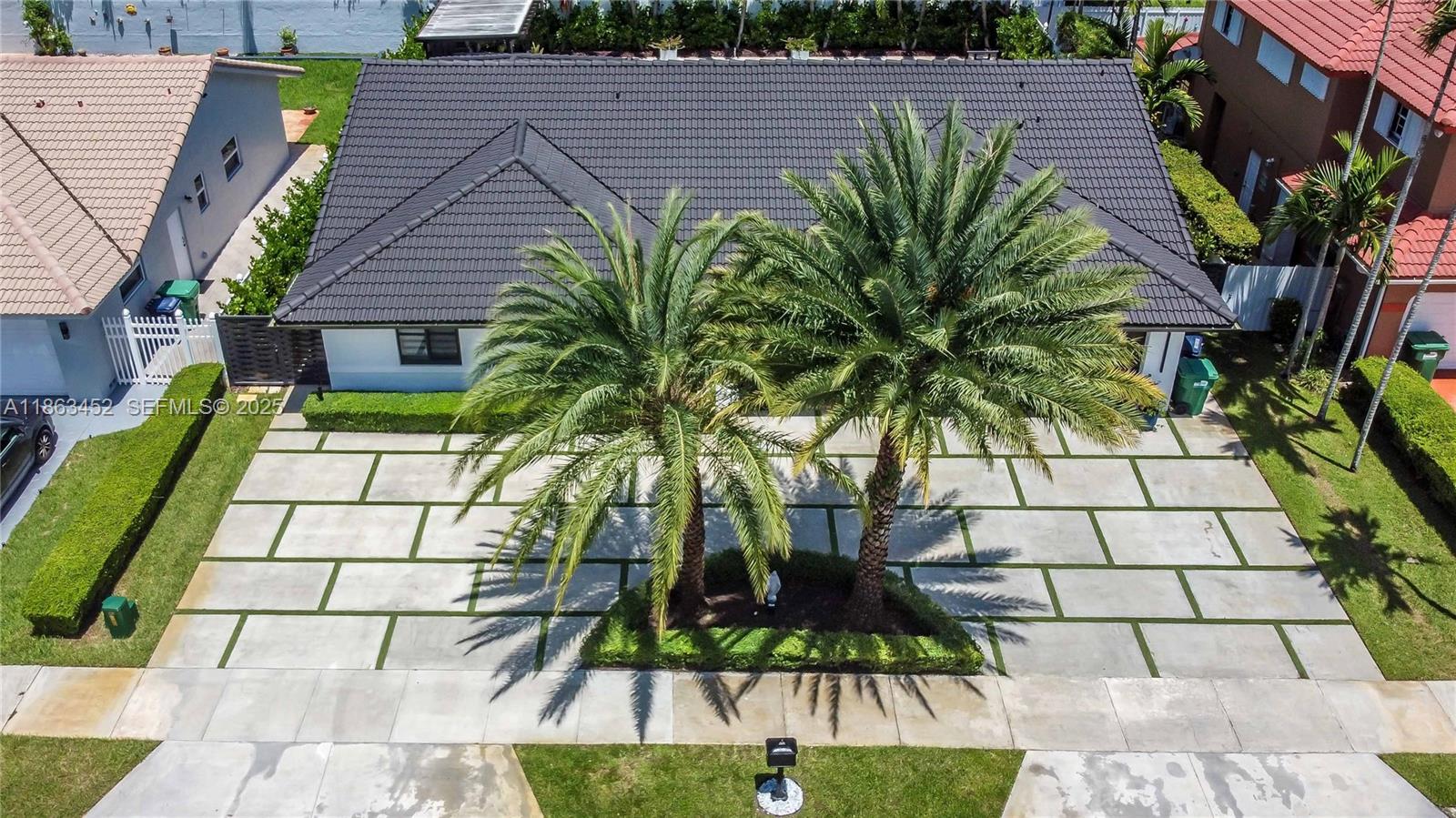 14211 Southwest 31st Street Miami, FL 33175 - Photo 2 of 27 a view of a backyard