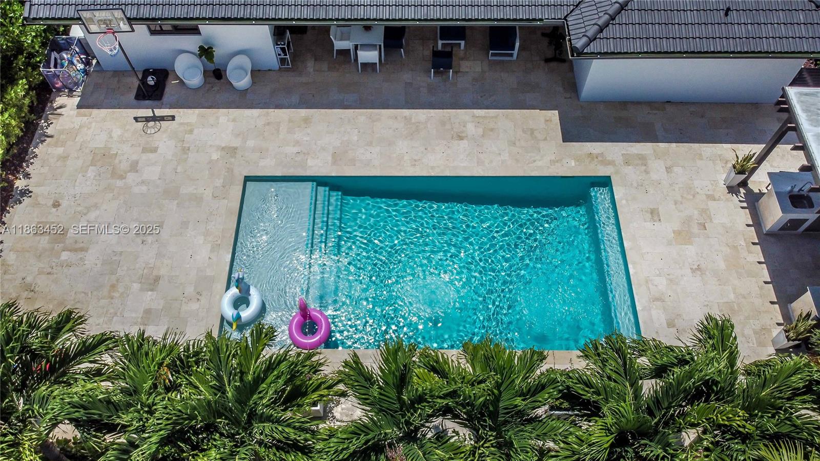 14211 Southwest 31st Street Miami, FL 33175 - Photo 7 of 27 a view of a backyard with hardwood