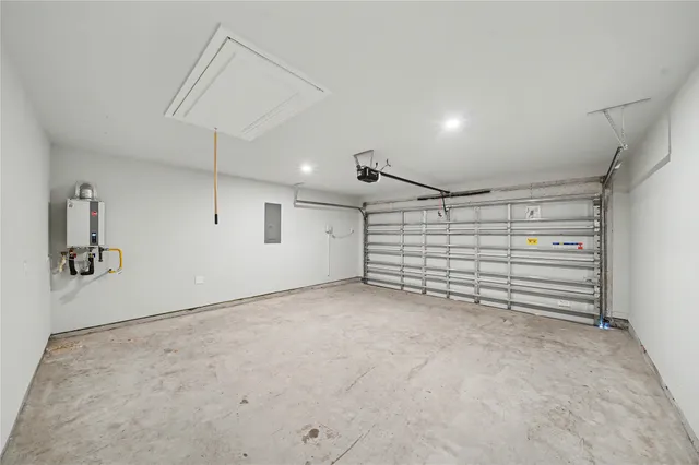 a view of a house with backyard and garden