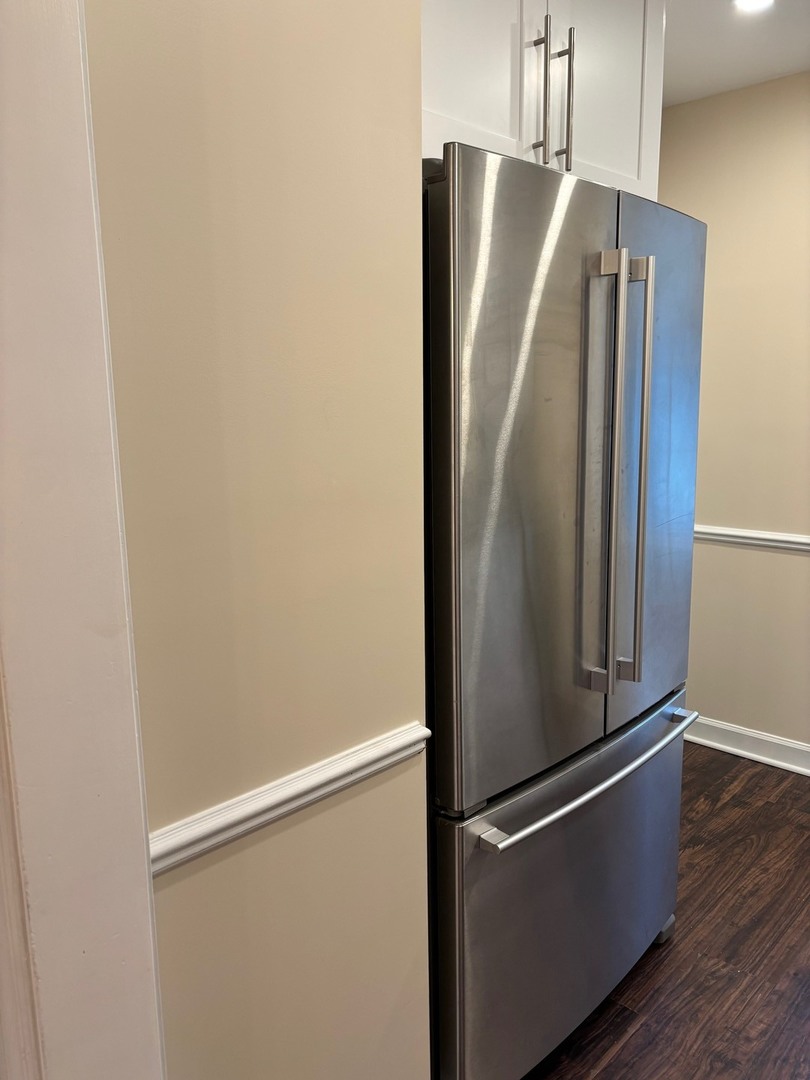 2003 Newton Avenue Park Ridge, IL 60068 - Photo 6 of 21 an empty refrigerator with wooden floor