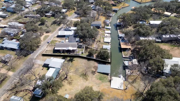 a view of residential houses with outdoor space
