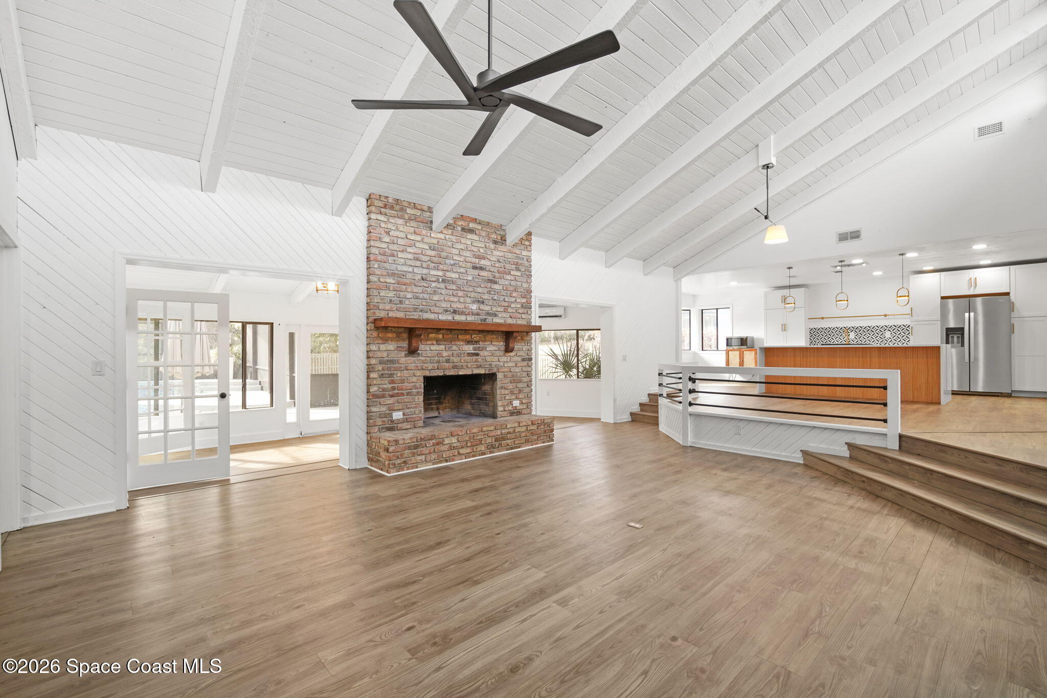 470 South Carpenter Road Titusville, FL 32796 - Photo 19 of 55 a view of livingroom with fireplace electronic appliances and furniture