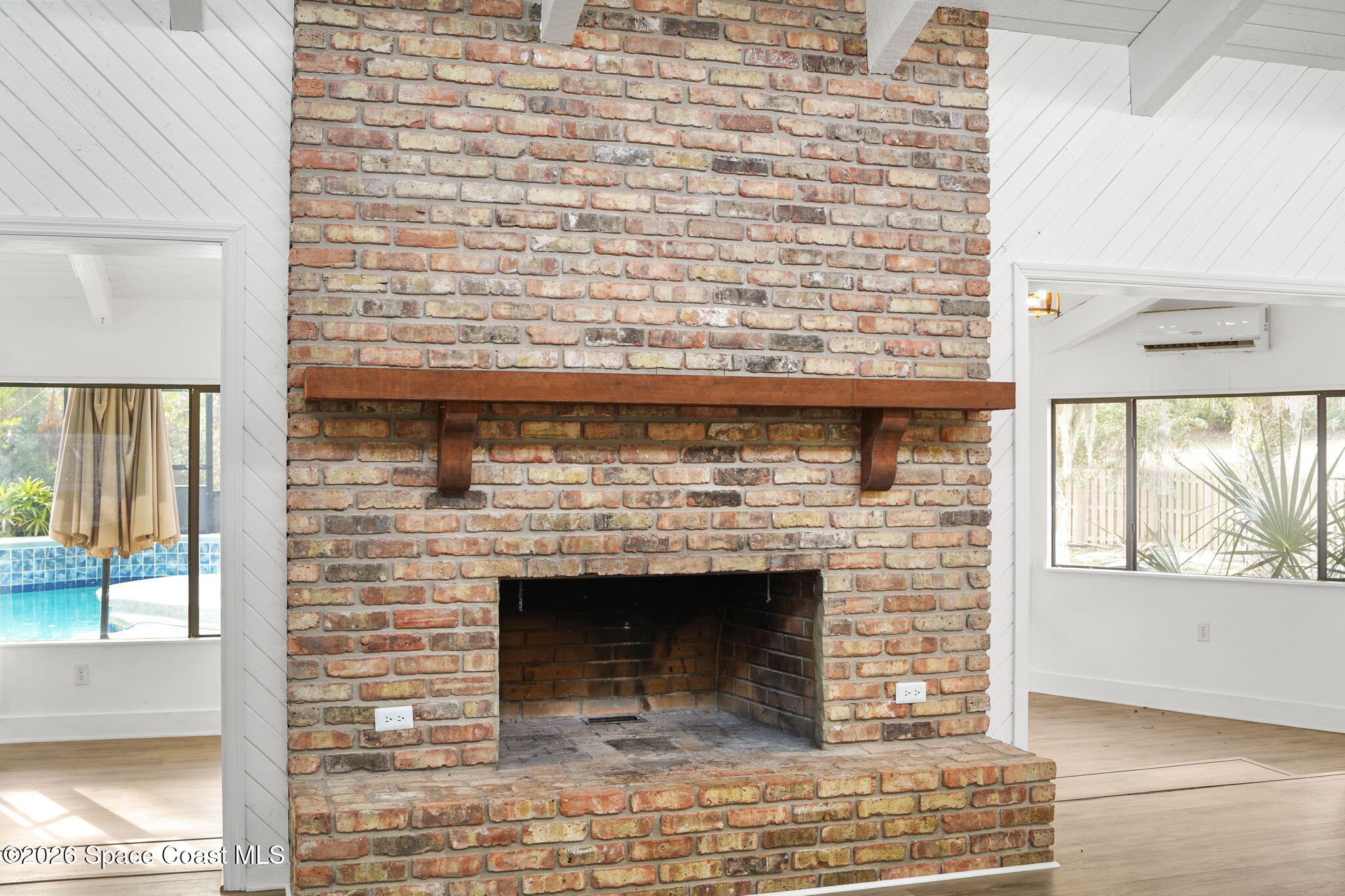 470 South Carpenter Road Titusville, FL 32796 - Photo 20 of 55 a view of fireplace and window
