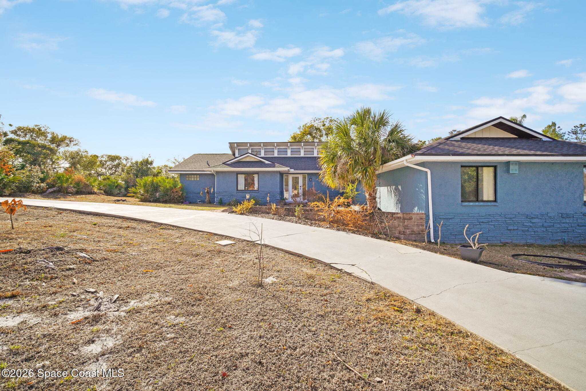 470 South Carpenter Road Titusville, FL 32796 - Photo 8 of 55 3-web-or-mls-CARPENTER_FRONT4