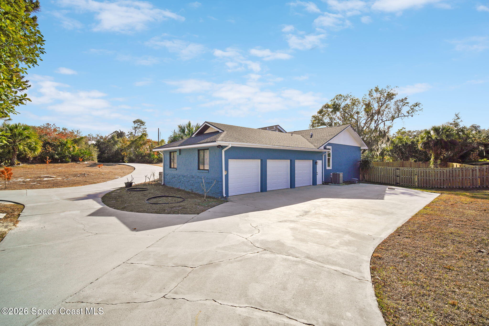 470 South Carpenter Road Titusville, FL 32796 - Photo 9 of 55 a view of house with outdoor space and sitting area