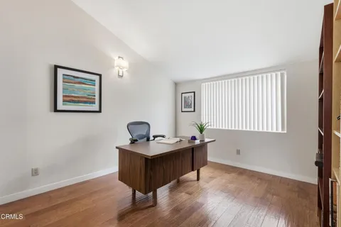 a room with furniture and a window