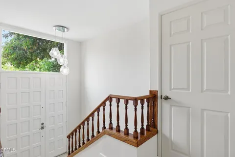 a view of a porch with wooden floor