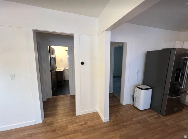 545 23rd Street Ogden, UT 84401 - Photo 10 of 28 Wood-finish flooring throughout, bright white walls, and clear doorframes