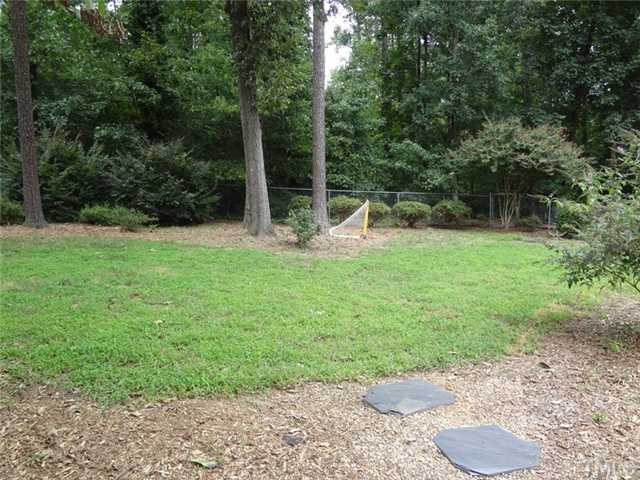 1501 Falls Church Road Raleigh, NC 27609 - Photo 24 of 25 a view of a backyard with a trampoline