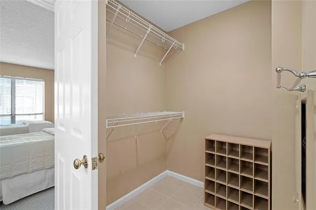 a view of bathroom with bathtub and shower