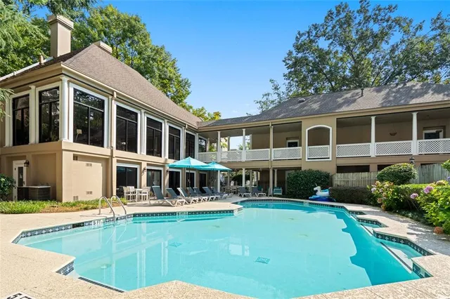 a view of a building with a swimming pool