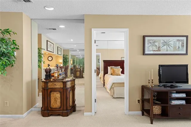 a view of living room with furniture and flat screen tv