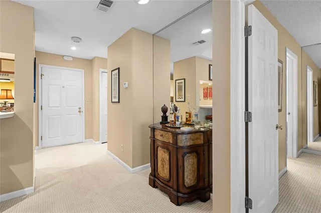 a view of a livingroom with washer and dryer