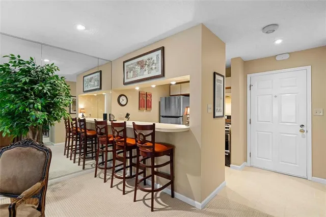 a view of a dining room with furniture