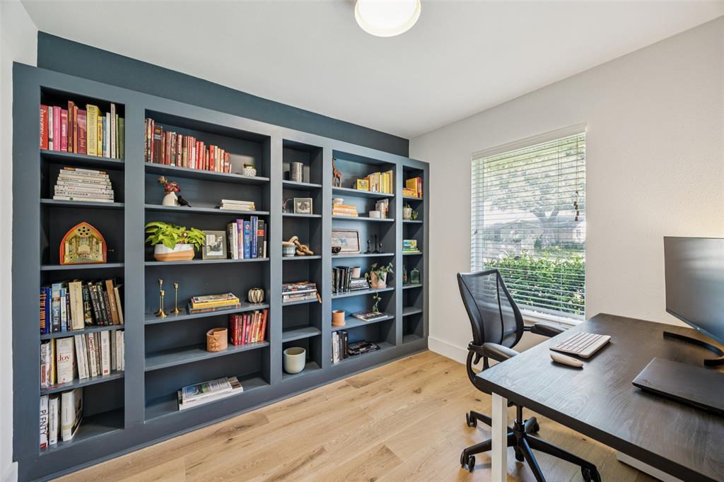 3412 Old Colony Road Dallas, TX 75233 - Photo 11 of 30 a view of a workspace with bookshelf and a window