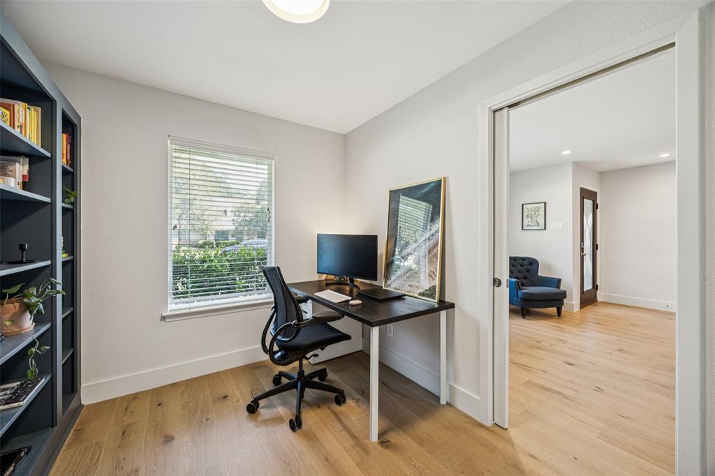 3412 Old Colony Road Dallas, TX 75233 - Photo 12 of 30 a view of a workspace with furniture and a window