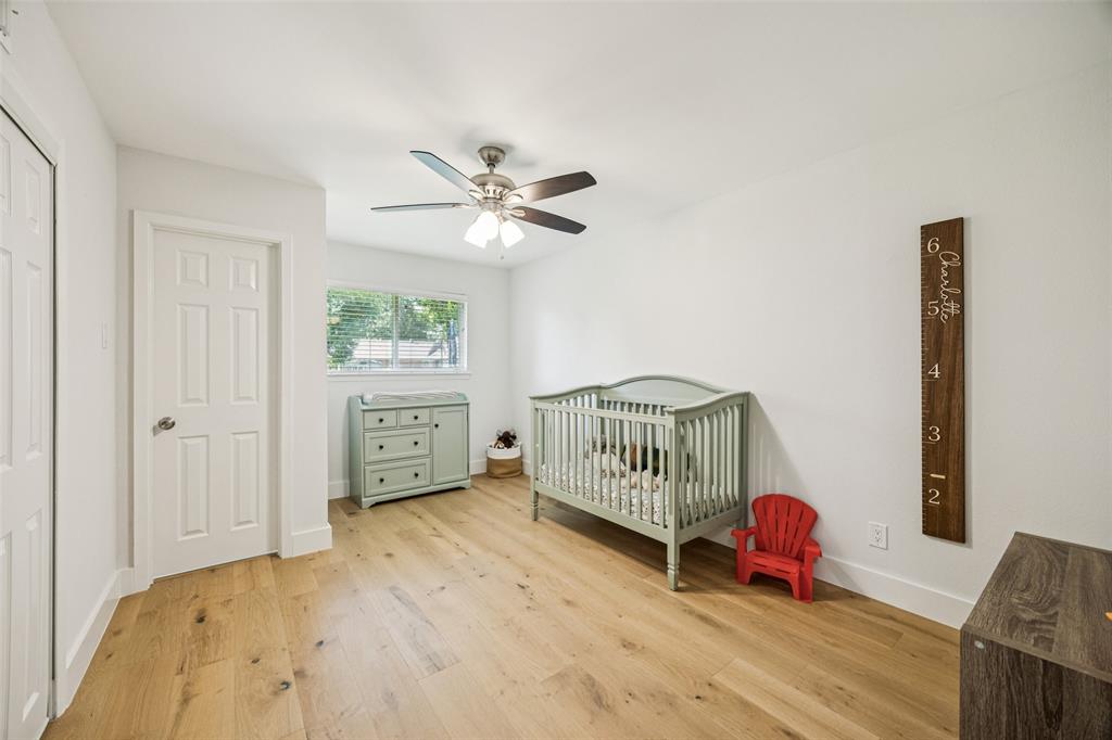 3412 Old Colony Road Dallas, TX 75233 - Photo 20 of 30 a bedroom with furniture and a window