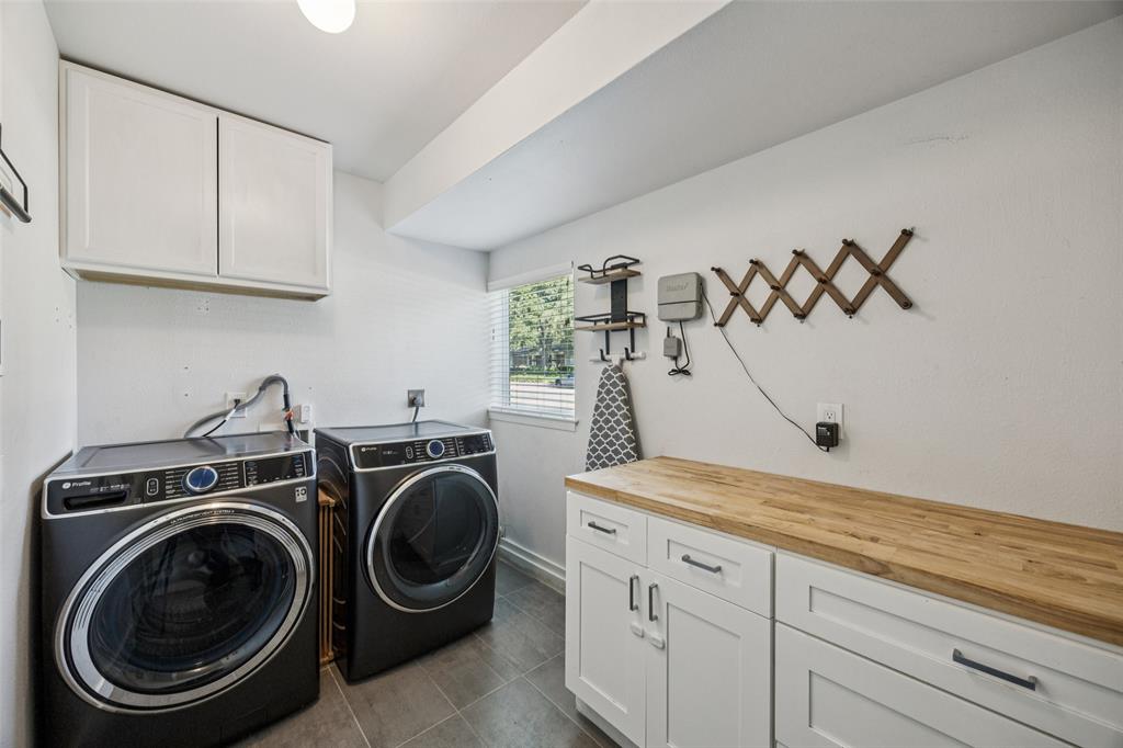 3412 Old Colony Road Dallas, TX 75233 - Photo 27 of 30 a utility room with sink dryer and washer