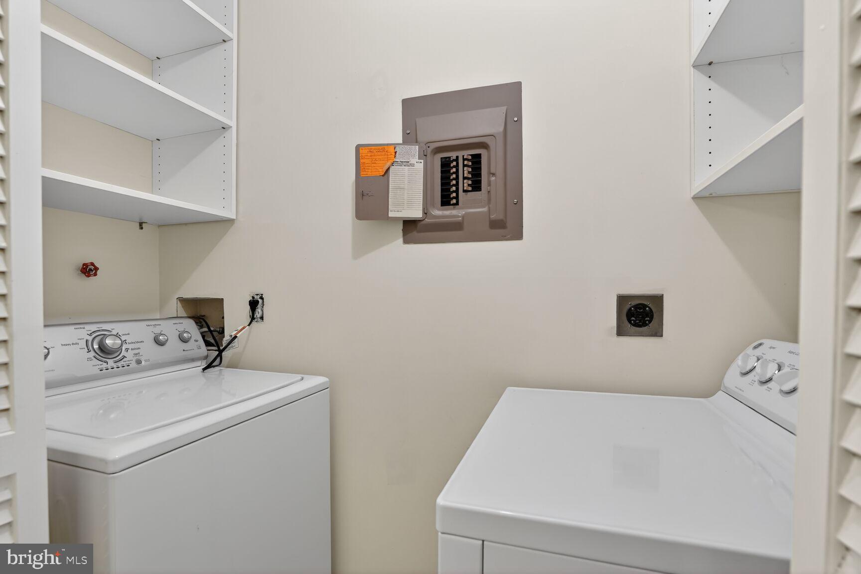 2273 Hunter's Run Drive Reston, VA 20191 - Photo 11 of 23 a bathroom with a sink washer and dryer