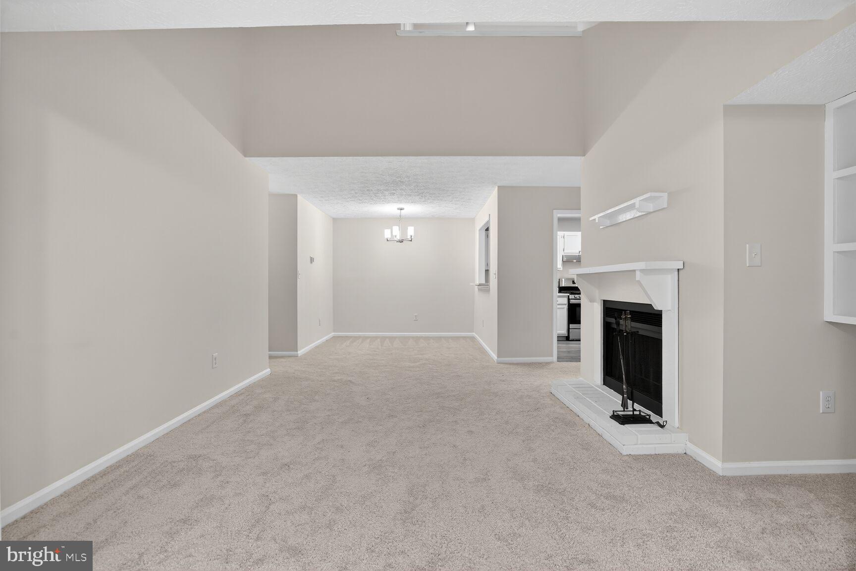 2273 Hunter's Run Drive Reston, VA 20191 - Photo 5 of 23 a view of a livingroom with a fireplace