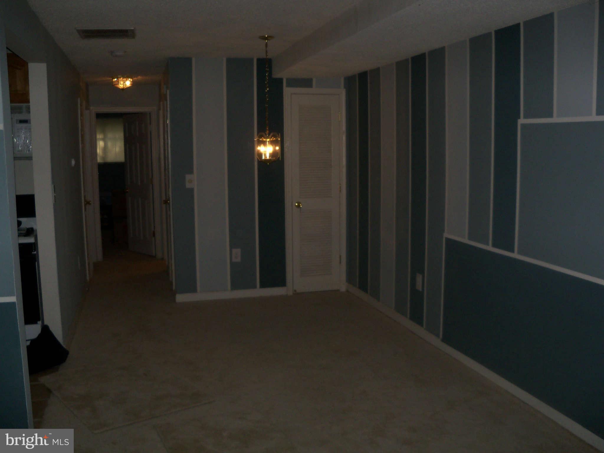 2610 Wade Road Southeast, Unit 106 Washington, DC 20020 - Photo 12 of 16 Living Room