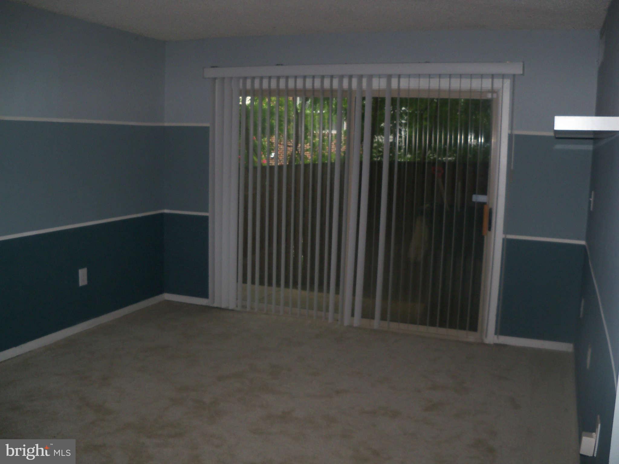 2610 Wade Road Southeast, Unit 106 Washington, DC 20020 - Photo 9 of 16 Living Room