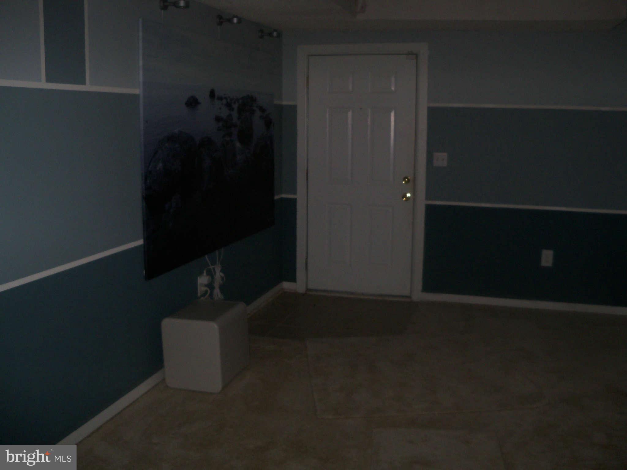 2610 Wade Road Southeast, Unit 106 Washington, DC 20020 - Photo 10 of 16 Living Room