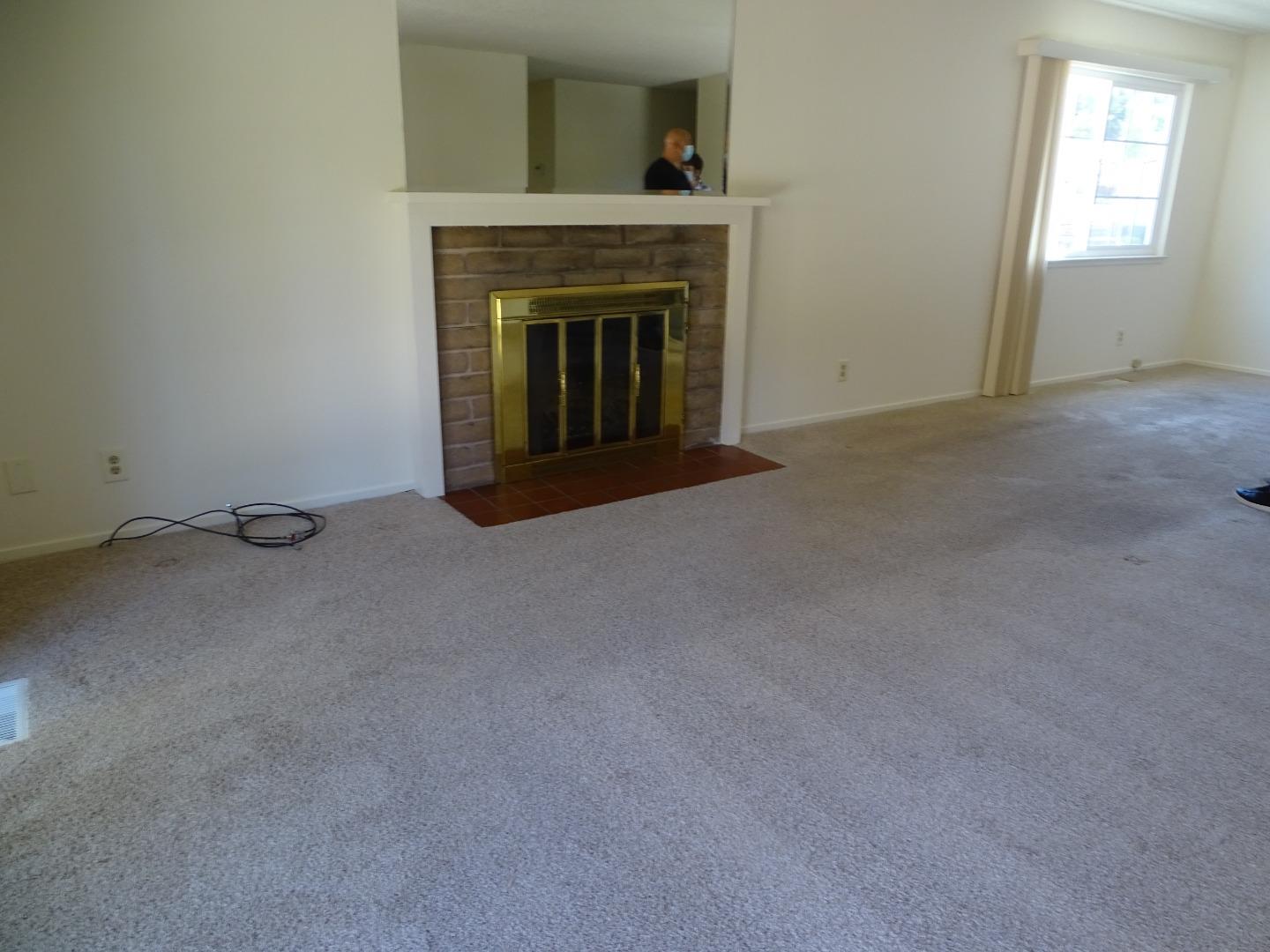 3345 Glendora Drive San Mateo, CA 94403 - Photo 13 of 19 a view of empty room with a fireplace