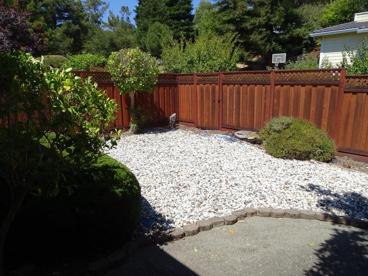 3345 Glendora Drive San Mateo, CA 94403 - Photo 14 of 19 a backyard of a house with lots of green space