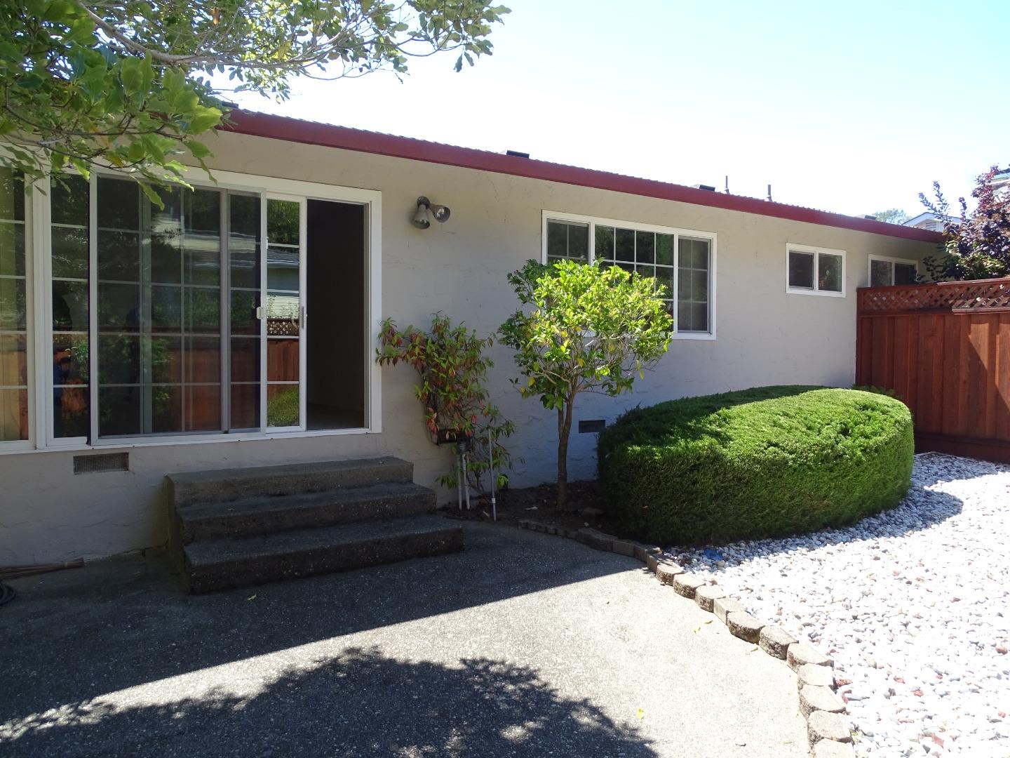 3345 Glendora Drive San Mateo, CA 94403 - Photo 16 of 19 a view of a backyard with potted plants