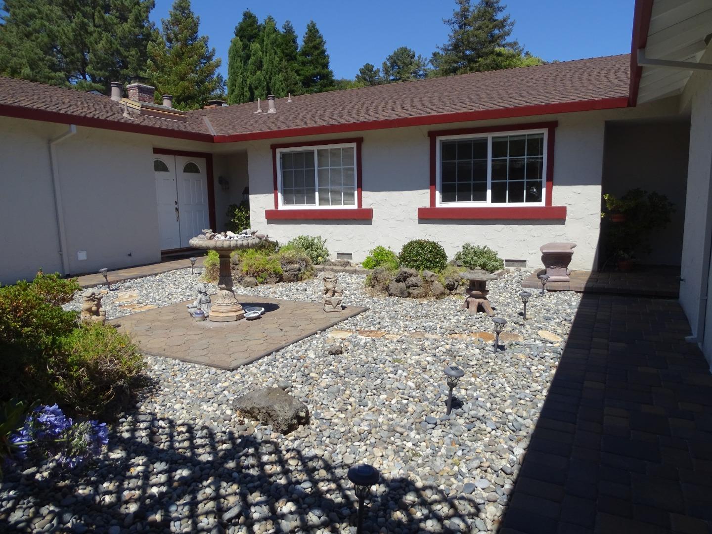 3345 Glendora Drive San Mateo, CA 94403 - Photo 18 of 19 front view of a house with a yard