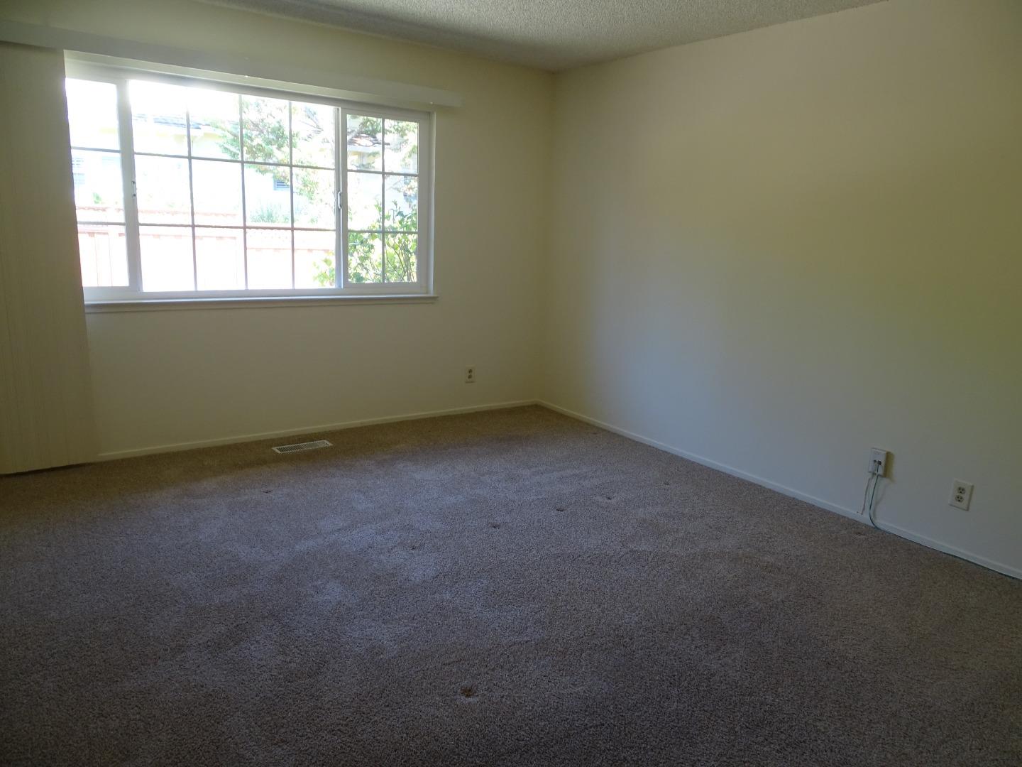 3345 Glendora Drive San Mateo, CA 94403 - Photo 9 of 19 an empty room with a window